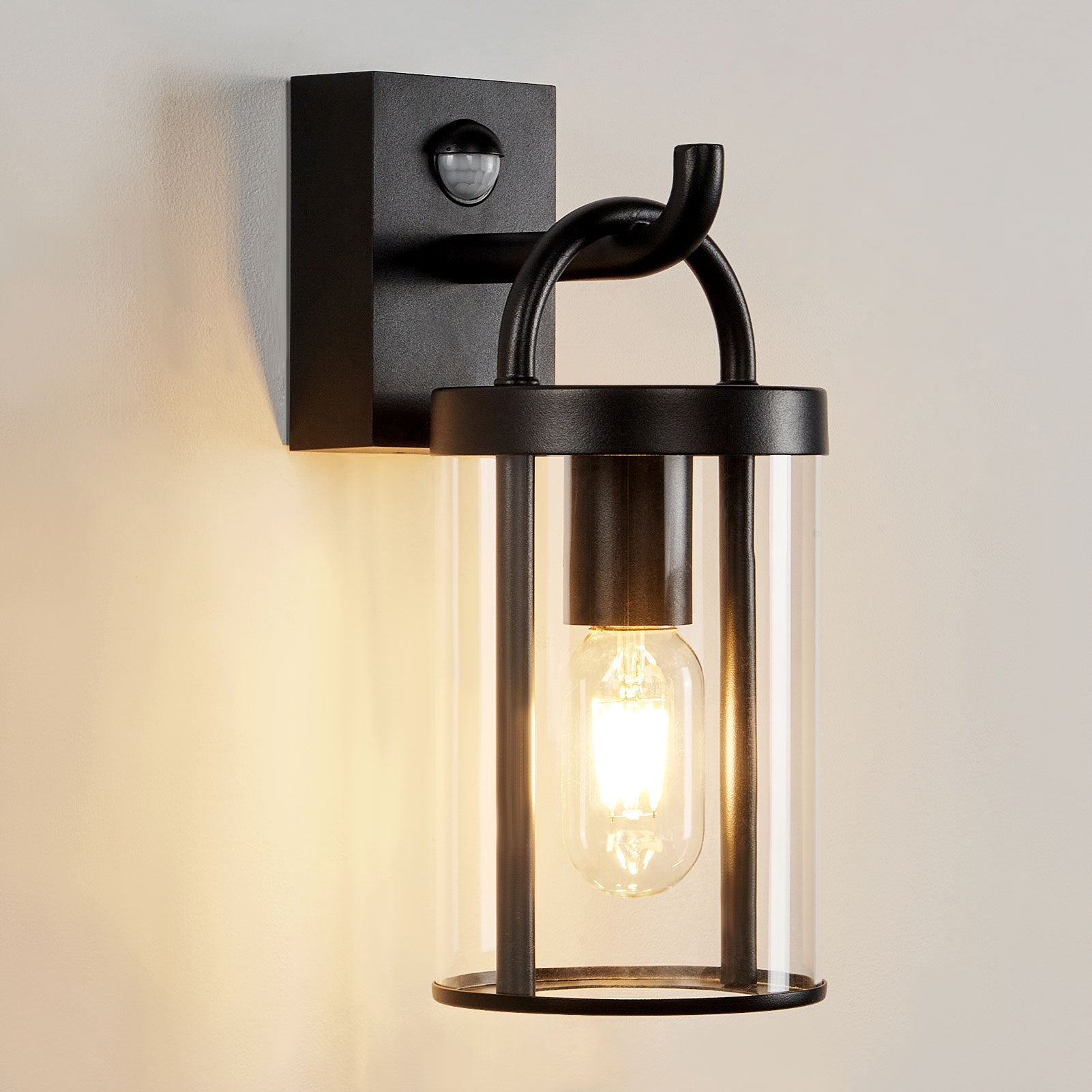 Black Outdoor PIR Sensor Wall Light and Sconce with Cylinder Clear Shade IP65 Weatherproof